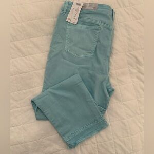 Chico’s So-slimming girlfriend jeans with fringed hem,